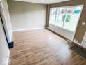 Spacious living area with hardwood floors and ample natural light at 2704 Seminole Dr, Anderson, IN 46012