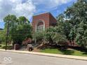 Brick school building with landscaping at 5844 Central Ave, Indianapolis, IN 46220