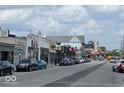 Bustling street scene with various shops and restaurants at 5844 Central Ave, Indianapolis, IN 46220