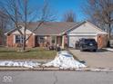 Ranch style home with a two car garage at 6264 Whitaker Farms Dr, Indianapolis, IN 46237