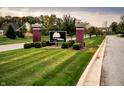 Thorpe Creek community entrance with brick pillars and iron gate at 6871 Oakdale Ln, Avon, IN 46123