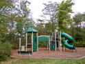 playground with green playset, slide, and bench at 6871 Oakdale Ln, Avon, IN 46123