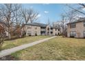 Beautiful condo complex features brick exteriors, balconies, and a large lawn space at 1737 E 56Th St # B, Indianapolis, IN 46220