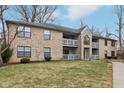 Condo building showcases brick exteriors, balconies, and well-maintained landscaping at 1737 E 56Th St # B, Indianapolis, IN 46220