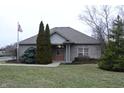 Community clubhouse with brick exterior and landscaping at 240 Legends Creek Pl # 103, Indianapolis, IN 46229