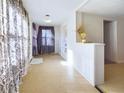 Bright living room featuring an open floor plan and stylish neutral decor at 2414 W 16Th St, Anderson, IN 46016
