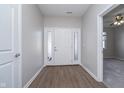 Bright entryway with hardwood floors and access to other rooms at 1623 Capra Ct, Beech Grove, IN 46107