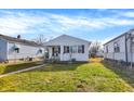 Cute bungalow style home with a spacious lawn and walkway at 1837 E Legrande Ave, Indianapolis, IN 46203