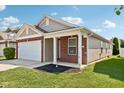 Ranch home with 2-car garage, brick, and siding at 573 New Moon St, Avon, IN 46123