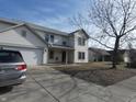 Two-story house with attached garage and driveway at 741 Crystal Farms Dr, Avon, IN 46123
