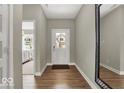 Inviting entryway with wood flooring and views to the outside at 16923 Sandhurst Pl, Westfield, IN 46074