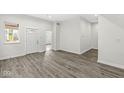 Bright and airy entryway with wood-look flooring and neutral walls at 350 E Minnesota St, Indianapolis, IN 46225