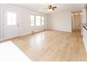 Bright living room featuring new floors, fresh paint, and plenty of natural light at 8505 W Jackson St, Muncie, IN 47304