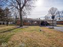 Brick ranch home with carport and spacious yard at 2325 Cardinal Dr, Indianapolis, IN 46227