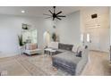 Modern living room featuring stylish furnishings, large mirror and bright open space at 8349 Tequista Cir, Indianapolis, IN 46236