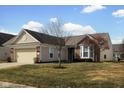 Lovely home with a well-manicured lawn and inviting curb appeal at 13998 Avalon Blvd, Fishers, IN 46037