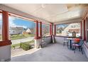 Inviting front porch with seating and a view of the residential street at 403 S Ohio St, Sheridan, IN 46069