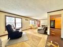 Spacious living room with large windows and neutral-toned walls at 6170 S County Road 675 E Rd, Plainfield, IN 46168