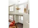 Bright foyer with high ceilings, large windows, decorative chandelier, and stylish furnishings at 10400 Hillsborough Dr, Fishers, IN 46037
