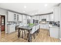 Bright kitchen with a large center island, modern appliances, and plenty of counter space for meal preparation at 13265 Talon Crest Dr, Fishers, IN 46037