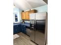 Cozy kitchen featuring stainless steel appliances and ample cabinet storage at 2650 W State Road 252, Flat Rock, IN 47234