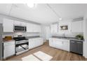 Modern kitchen with stainless steel appliances, sleek countertops, and ample cabinet space at 453 Carol Dr, Greenwood, IN 46143