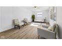 Bright and airy living room with neutral decor and lots of natural light at 453 Carol Dr, Greenwood, IN 46143