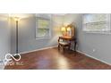 Bedroom with hardwood floors, natural light, and a vanity at 727 Sunset Blvd, Greenwood, IN 46142