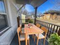 Inviting porch area with outdoor seating, perfect for relaxing and enjoying the neighborhood views at 117 W 36Th St, Indianapolis, IN 46208