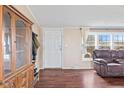 Comfortable living room with ample natural light, complemented by hardwood floors at 4676 Autumn Ridge Dr, Columbus, IN 47203