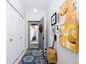 Inviting entryway with neutral walls, and decorative artwork at 8211 River Bay E Dr, Indianapolis, IN 46240
