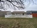 A fenced backyard offers privacy and space for outdoor enjoyment at 1629 Jaques Dr, Lebanon, IN 46052