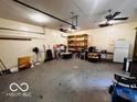 Spacious garage interior with ample storage and room for multiple vehicles at 1039 W 550 S, Trafalgar, IN 46181