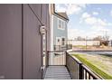Balcony with black metal railing overlooking the street at 2149 N College Ave, Indianapolis, IN 46202