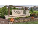 Stone sign for Saddle Club community, featuring manicured landscaping and a welcoming entrance at 4268 Winners Cir, Bargersville, IN 46106
