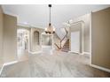 Bright, spacious living room with staircase at 685 Greystone Ct, Columbus, IN 47201
