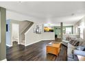 Spacious living room with easy access to the Kitchen and Dining areas and backyard at 12702 Loyalty Dr, Fishers, IN 46037