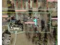 Aerial view showing the property's layout and surrounding landscape at 1300 W University Ave, Muncie, IN 47303