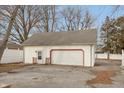 Detached two car garage with updated doors and neutral paint at 518 E College Ave, Brownsburg, IN 46112