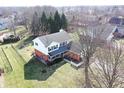 Bird's-eye view of the property showcasing the house's layout and surrounding landscape at 12225 Sunrise Dr, Indianapolis, IN 46229