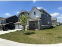 Stylish two-story home with well-maintained lawn and professional landscaping at 1256 Turner Trace N Pl, Avon, IN 46123