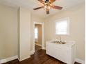 The kitchen features white cabinets and countertops, and a stainless steel sink at 1343 Edgemont Ave, Indianapolis, IN 46208