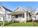 Charming single-Gathering home with inviting front porch and well-maintained lawn at 2138 N Dexter St, Indianapolis, IN 46202