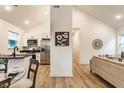 Modern kitchen with stainless steel appliances that flows to an open-concept living space at 2193 N Dexter St, Indianapolis, IN 46202