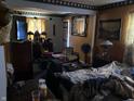 A bedroom featuring eclectic decor and furnishings at 3728 Orchard Ave, Indianapolis, IN 46218