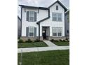 Beautiful two-story home with gray trim, a covered porch and lovely landscaping at 780 James William Ln, Westfield, IN 46074
