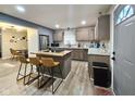 Well-equipped kitchen boasting granite countertops, stainless steel appliances, and a stylish center island at 498 Johnson Ave, Franklin, IN 46131