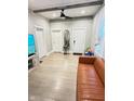 Cozy living room features light wood floors and neutral wall color at 929 W Roache St, Indianapolis, IN 46208