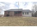 Charming single Gathering home with a covered front porch and an American flag at 7811 W 700 S, Jamestown, IN 46147