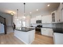 Well-equipped kitchen with black countertops and stainless steel appliances at 12964 Walbeck Dr, Fishers, IN 46037